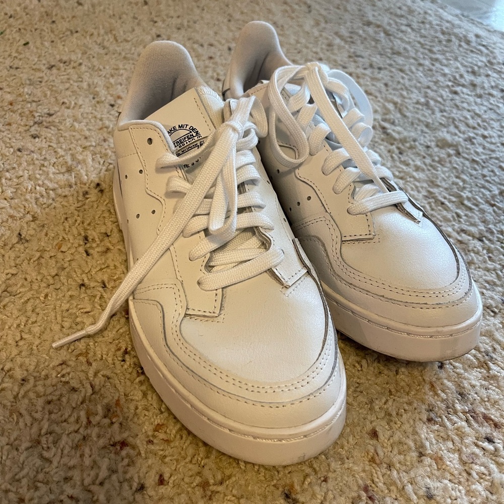 Adidas white three strip sneakers